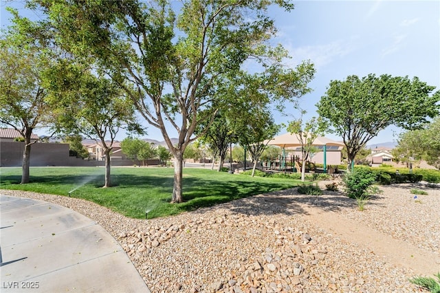 2482 Denholme St, Henderson, NV 89044 - view of community featuring a yard