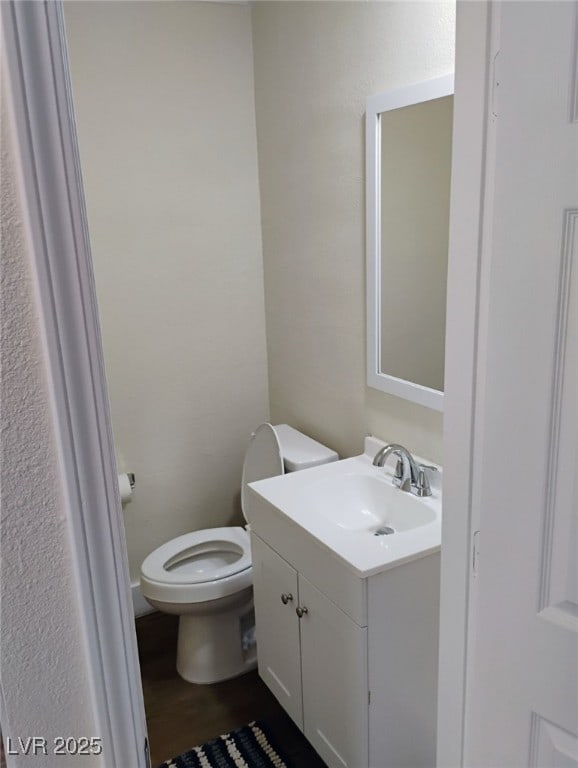 4525 Fulton Pl, Las Vegas, NV 89107 - half bathroom with vanity and toilet