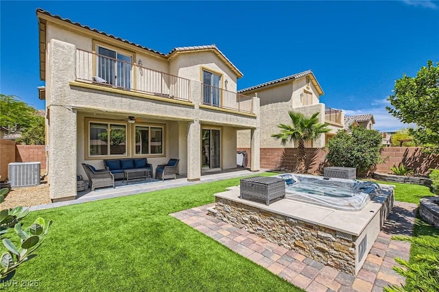 7424 Rainford St, Las Vegas, NV 89148 - back of house featuring a balcony, an outdoor hot tub, an outdoor living space, stucco siding, and cooling unit