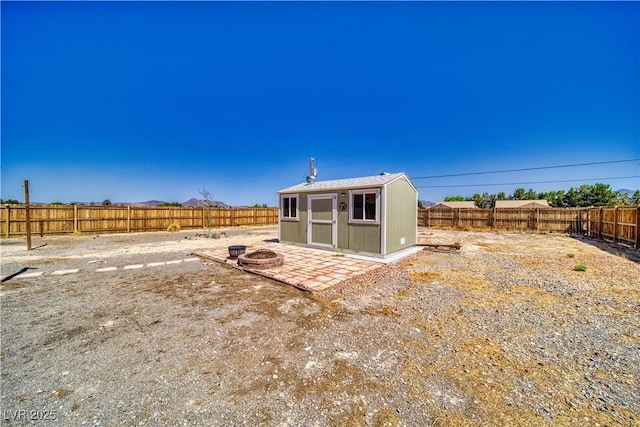 1190 W Sierra Vista Cir, Pahrump, NV 89060 - fenced backyard featuring a fire pit