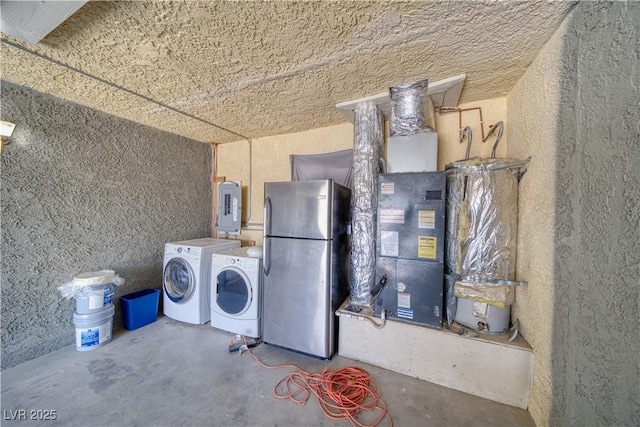 1190 W Sierra Vista Cir, Pahrump, NV 89060 - laundry area with independent washer and dryer, electric panel, and a textured wall