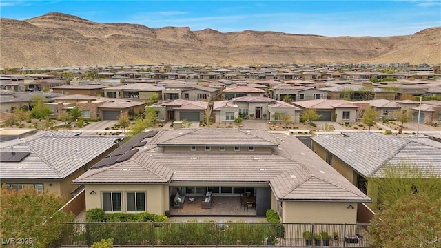 6700 Regency Stone Way, Las Vegas, NV 89148 - aerial perspective of suburban area with a mountain backdrop