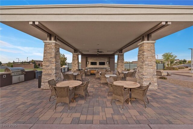 6700 Regency Stone Way, Las Vegas, NV 89148 - view of patio / terrace with outdoor dining space, ceiling fan, and an outdoor hangout area