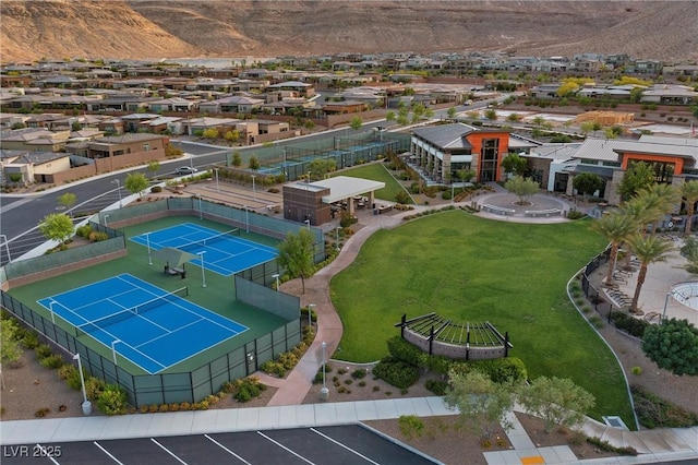 6700 Regency Stone Way, Las Vegas, NV 89148 - aerial view of residential area featuring a mountain backdrop