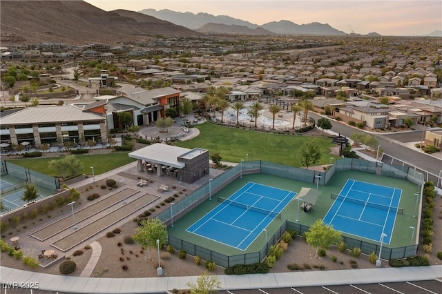 6700 Regency Stone Way, Las Vegas, NV 89148 - aerial view of residential area with a mountain backdrop