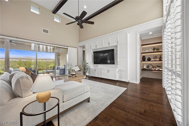 6700 Regency Stone Way, Las Vegas, NV 89148 - living area featuring a ceiling fan, dark wood finished floors, beam ceiling, a towering ceiling, and recessed lighting