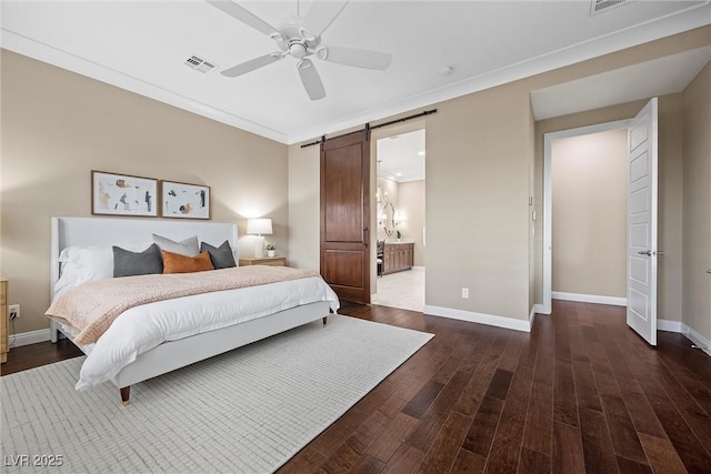 6700 Regency Stone Way, Las Vegas, NV 89148 - bedroom featuring a barn door, wood finished floors, baseboards, ceiling fan, and ornamental molding