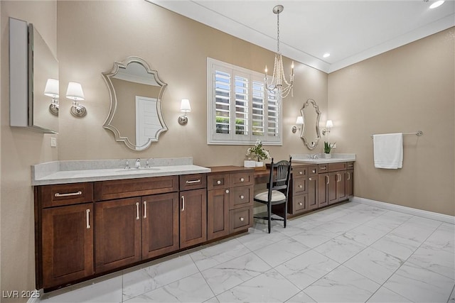 6700 Regency Stone Way, Las Vegas, NV 89148 - full bath featuring marble look tiles, two vanities, a chandelier, and baseboards