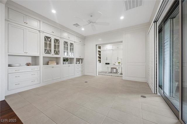 6700 Regency Stone Way, Las Vegas, NV 89148 - unfurnished room featuring a ceiling fan, light tile patterned floors, recessed lighting, and a decorative wall