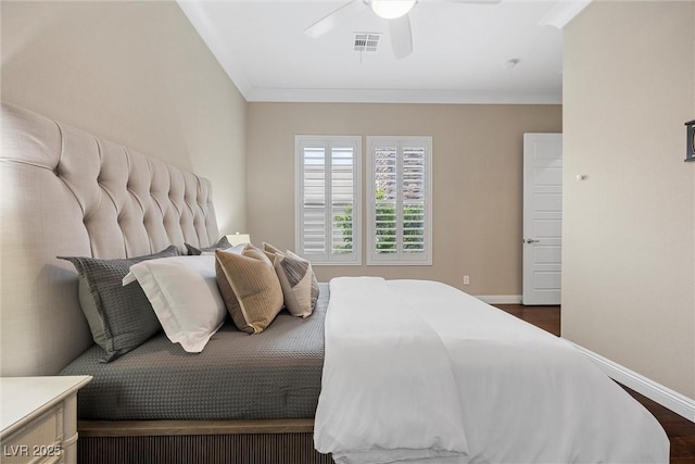6700 Regency Stone Way, Las Vegas, NV 89148 - bedroom with baseboards, dark wood-style floors, and ceiling fan