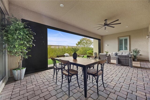 6700 Regency Stone Way, Las Vegas, NV 89148 - view of patio with ceiling fan, an outdoor living space, and outdoor dining area