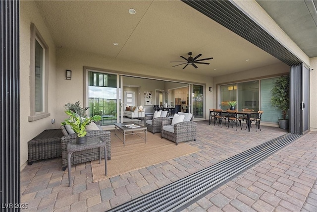 6700 Regency Stone Way, Las Vegas, NV 89148 - view of patio with an outdoor living space, ceiling fan, and outdoor dining area