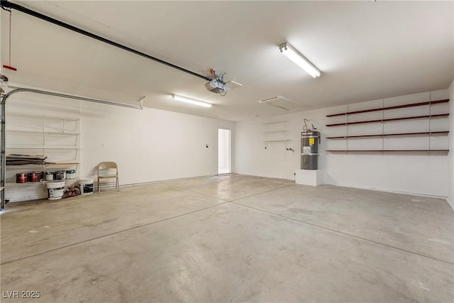 480 China St, Pahrump, NV 89048 - garage featuring a garage door opener and water heater