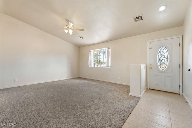 480 China St, Pahrump, NV 89048 - foyer with ceiling fan, lofted ceiling, baseboards, light tile patterned floors, and light carpet