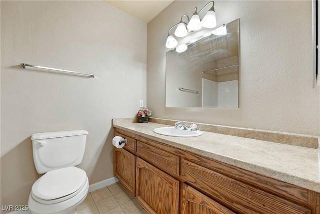 480 China St, Pahrump, NV 89048 - bathroom featuring toilet, vanity, and tile patterned floors