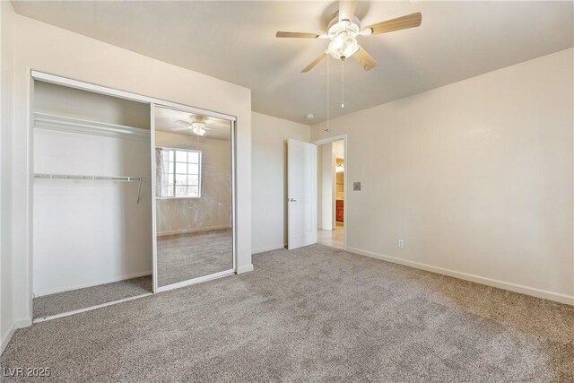480 China St, Pahrump, NV 89048 - unfurnished bedroom with carpet flooring, baseboards, a closet, and ceiling fan