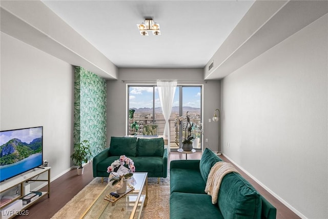 8255 Las Vegas Blvd Unit 1219, Las Vegas, NV 89123 - living room with baseboards and wood finished floors