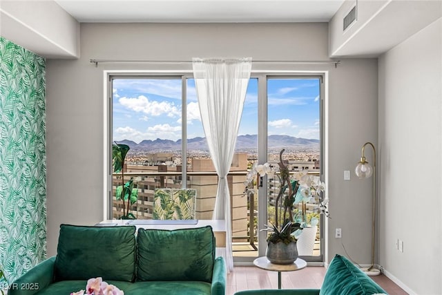 8255 Las Vegas Blvd Unit 1219, Las Vegas, NV 89123 - sitting room with a mountain view, plenty of natural light, and baseboards