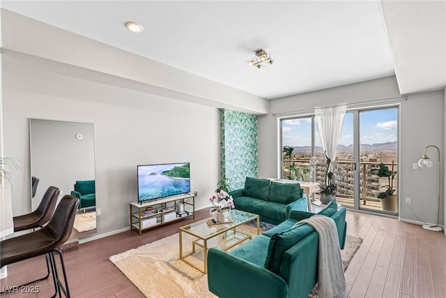 8255 Las Vegas Blvd Unit 1219, Las Vegas, NV 89123 - living area featuring wood finished floors and baseboards