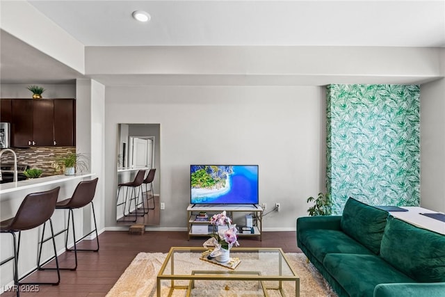 8255 Las Vegas Blvd Unit 1219, Las Vegas, NV 89123 - living room with dark wood finished floors, baseboards, and recessed lighting