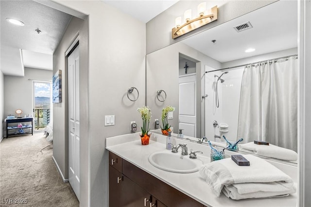 8255 Las Vegas Blvd Unit 1219, Las Vegas, NV 89123 - bathroom with vanity, a shower with curtain, and recessed lighting