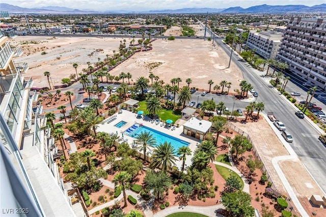 8255 Las Vegas Blvd Unit 1219, Las Vegas, NV 89123 - drone / aerial view of a pool area and a mountainous background