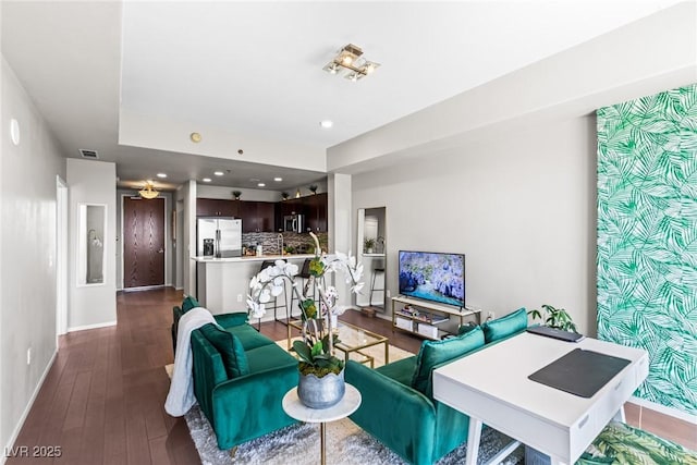 8255 Las Vegas Blvd Unit 1219, Las Vegas, NV 89123 - living room featuring baseboards, dark wood finished floors, and recessed lighting