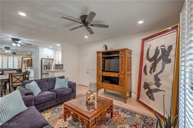 75 N Valle Verde Dr Unit 211, Henderson, NV 89074 - living room featuring a ceiling fan, light wood finished floors, and recessed lighting