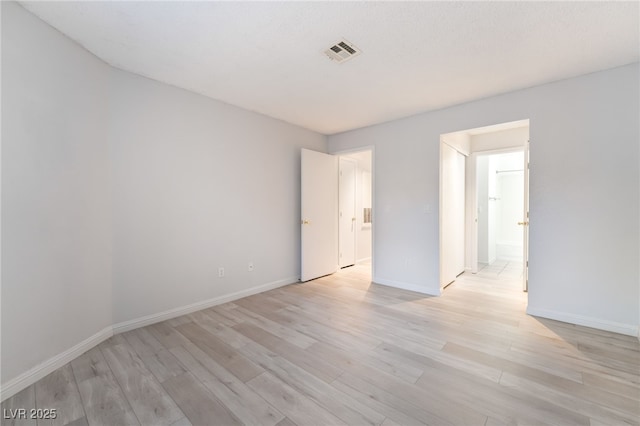 6871 Tamarus St Unit 204, Las Vegas, NV 89119 - unfurnished room featuring light wood-style flooring and baseboards