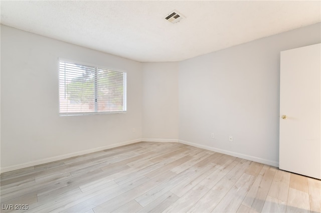 6871 Tamarus St Unit 204, Las Vegas, NV 89119 - unfurnished room with light wood-style floors and baseboards