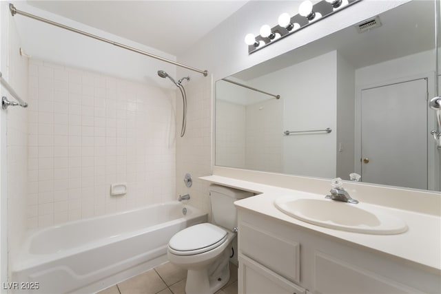 6871 Tamarus St Unit 204, Las Vegas, NV 89119 - full bathroom featuring bathing tub / shower combination, vanity, tile patterned floors, and toilet