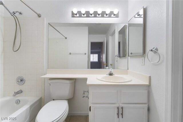 6871 Tamarus St Unit 204, Las Vegas, NV 89119 - bathroom with shower / bath combination, toilet, vanity, and tile patterned floors