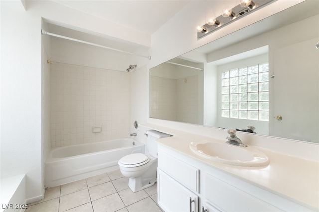 6871 Tamarus St Unit 204, Las Vegas, NV 89119 - full bath featuring tile patterned flooring, vanity,  shower combination, and toilet