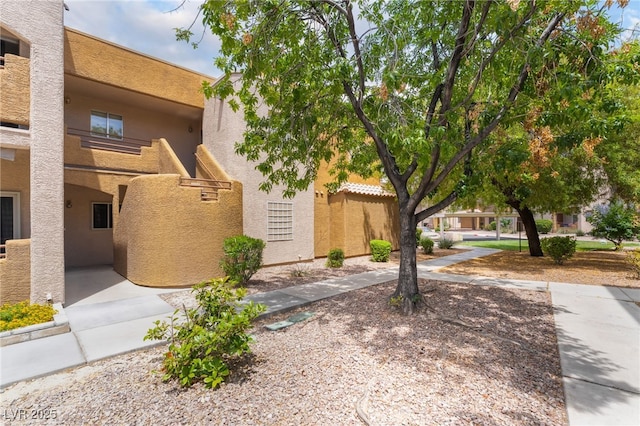 6871 Tamarus St Unit 204, Las Vegas, NV 89119 - view of front of house featuring stucco siding