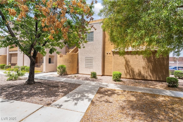 6871 Tamarus St Unit 204, Las Vegas, NV 89119 - view of front of home with stucco siding