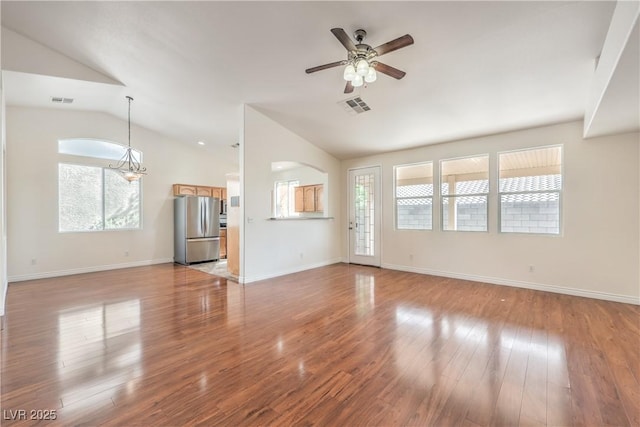 202 Twin Creek St, Henderson, NV 89074 - unfurnished living room featuring vaulted ceiling, ceiling fan, light wood-type flooring, and baseboards