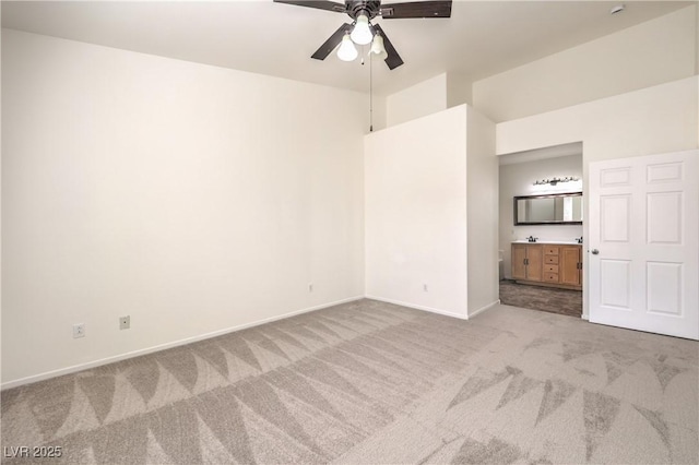 202 Twin Creek St, Henderson, NV 89074 - unfurnished bedroom featuring carpet, baseboards, connected bathroom, and ceiling fan