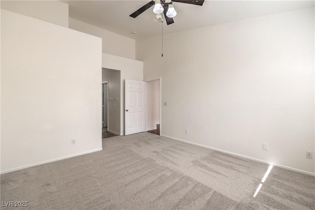 202 Twin Creek St, Henderson, NV 89074 - unfurnished room featuring carpet, a ceiling fan, baseboards, and a towering ceiling