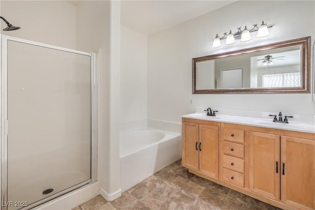 202 Twin Creek St, Henderson, NV 89074 - bathroom featuring a garden tub, a stall shower, double vanity, and a ceiling fan