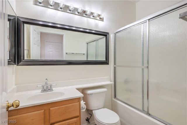202 Twin Creek St, Henderson, NV 89074 - bathroom featuring toilet, vanity, and combined bath / shower with glass door