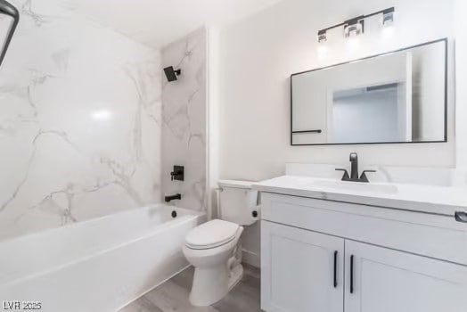 2553 Showcase Dr, Las Vegas, NV 89134 - full bathroom with vanity, toilet, and  shower combination