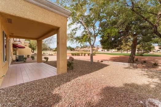 2553 Showcase Dr, Las Vegas, NV 89134 - view of yard with central AC and a patio area