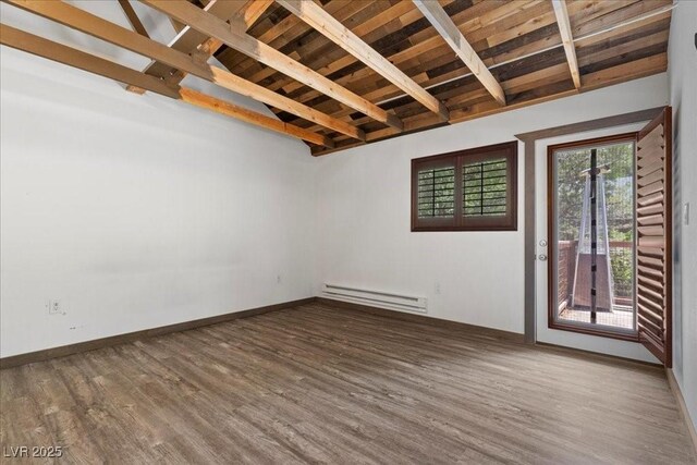 3971 Arlberg Way, Mount Charleston, NV 89124 - unfurnished room with baseboard heating, wooden ceiling, wood finished floors, and baseboards