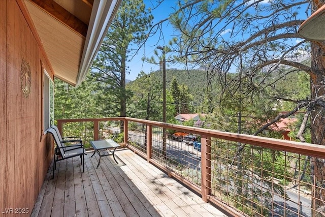 3971 Arlberg Way, Mount Charleston, NV 89124 - wooden terrace with a mountain view and a wooded view