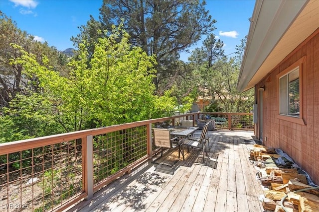 3971 Arlberg Way, Mount Charleston, NV 89124 - wooden terrace with outdoor dining area