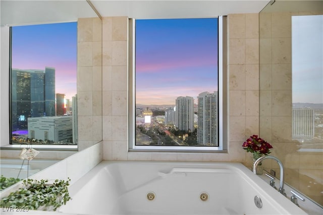 222 Karen Ave Unit 3307, Las Vegas, NV 89109 - full bath featuring a view of city, a whirlpool tub, and plenty of natural light
