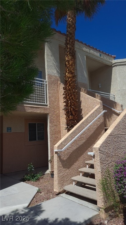 5000 Red Rock St Unit 248, Las Vegas, NV 89118 - view of exterior entry featuring stucco siding