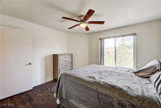 5000 Red Rock St Unit 248, Las Vegas, NV 89118 - bedroom featuring dark wood-style floors and a ceiling fan