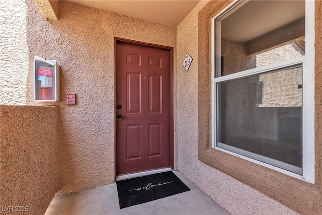 1150 N Buffalo Dr Unit 2025, Las Vegas, NV 89128 - doorway to property featuring stucco siding