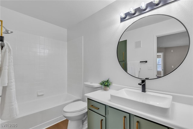 1150 N Buffalo Dr Unit 2025, Las Vegas, NV 89128 - bathroom featuring vanity, washtub / shower combination, and wood finished floors